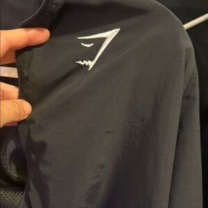 Gymshark Black Jacket with Subtle Gray Logo Tag